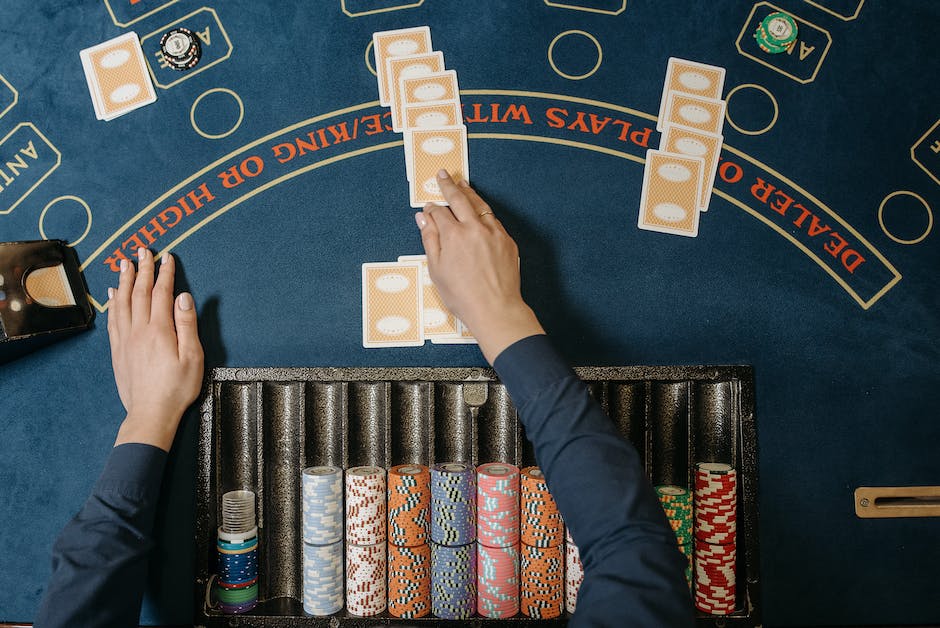 A visual representation of blackjack cards and chips on a casino table