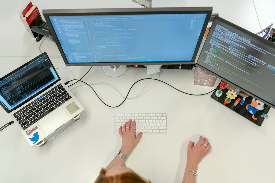 Image of a software developer working on the computer.